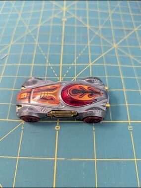2012 Mattel Die-Cast  Kids Toy Car with Red and Orange Flame Design